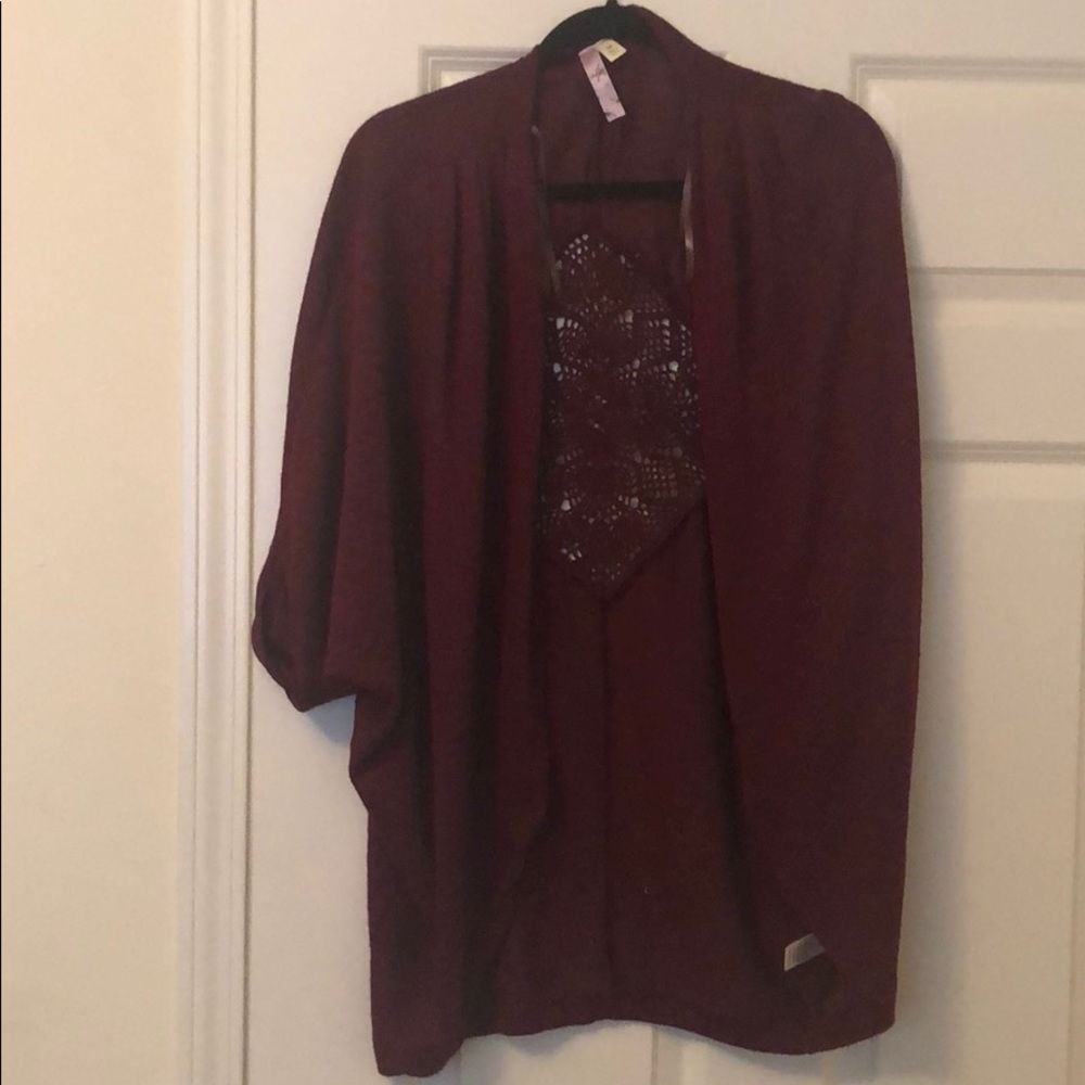 Alya sweater with appliqué on back, never worn